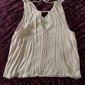 Charlotte Russe - tank w/ cut out front & tassel accents.